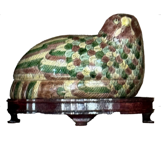 Pair of quail porcelain boxes on wooden stand.