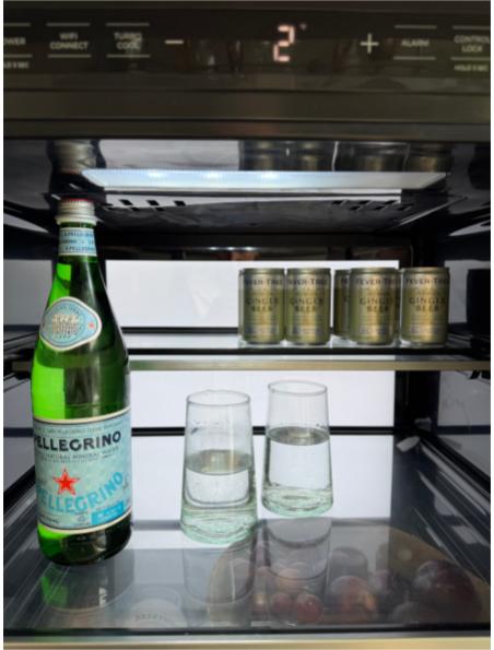 Tall Clear Glass (inside mini fridge behind bar)